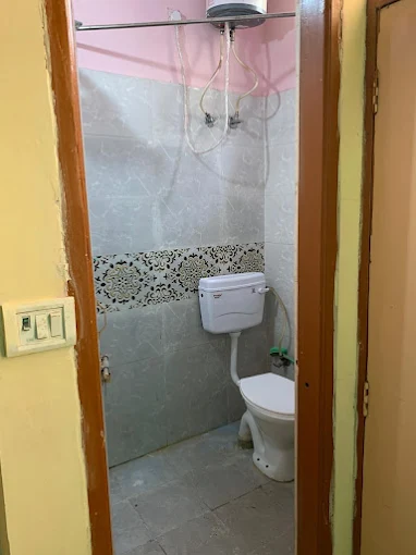 Bathroom with geyser at Yadav PG Sector 8 Dwarka