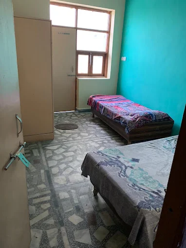 Dwarka room at Yadav PG